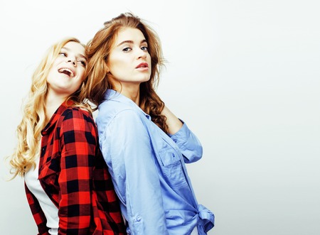 best friends teenage girls together having fun, posing emotionalの写真素材