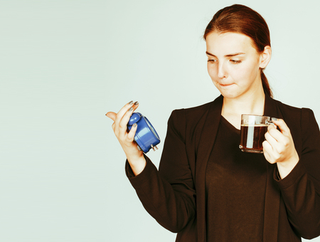 young beauty woman in business style costume waking up for workの写真素材