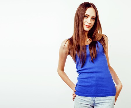 young pretty stylish hipster girl posing emotional isolated on wの写真素材