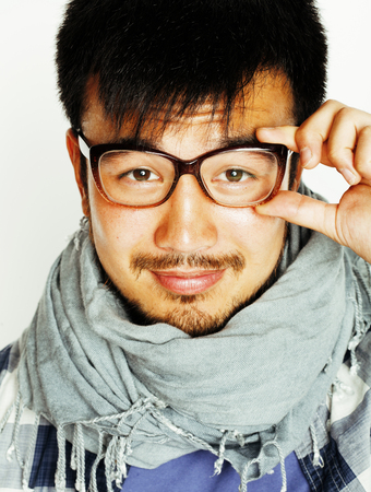 young handsome asian man hipster in glasses on white background,の写真素材