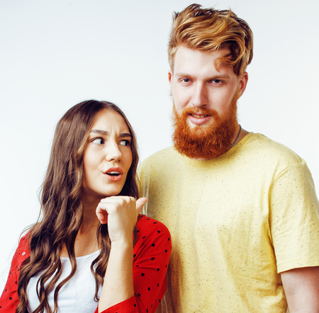 young attractive couple together having fun happy smiling isolated on white background, emotional posing, lifestyle people conceptの写真素材