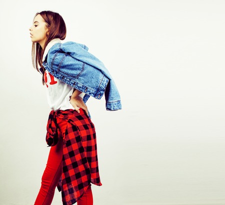 young pretty stylish hipster girl posing emotional isolated on wの写真素材