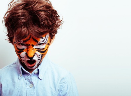 little cute boy with faceart on birthday party close up, littleの写真素材