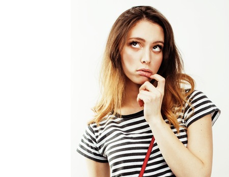 young pretty teenage hipster girl posing emotional happy smilingの写真素材