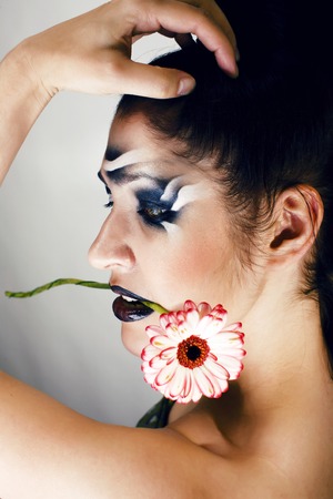 beauty young woman with creative make up like zebra closeup, wavの写真素材