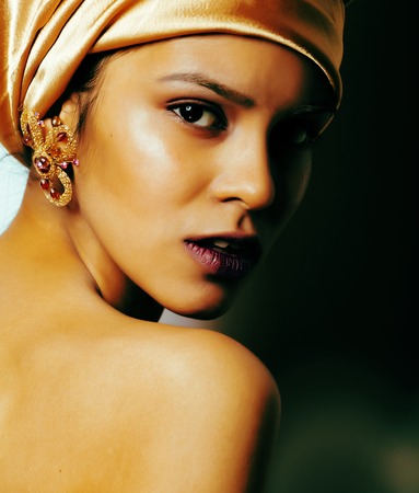 beauty african woman in shawl on head, very elegant look with go