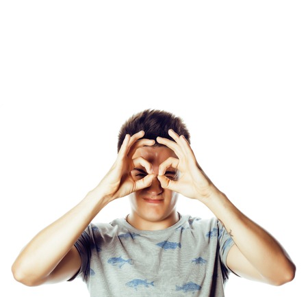 young handsome teenage hipster guy posing emotional, happy smili