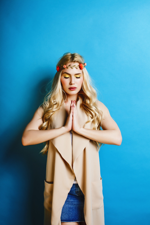 young blond woman dressed like ancient greek godess, jewelry cloの写真素材