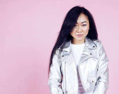 young pretty smiling asian korean girl wearing modern fashion clの写真素材