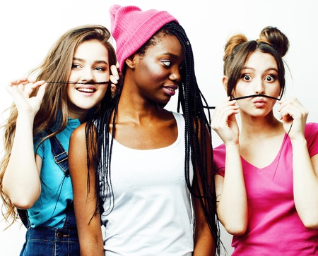 diverse nation girls group, teenage friends company cheerful havの写真素材