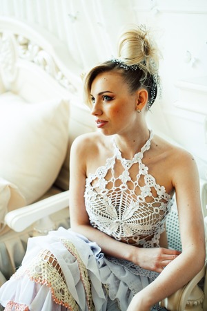 beauty emotional blond bride in luxury interiorの写真素材