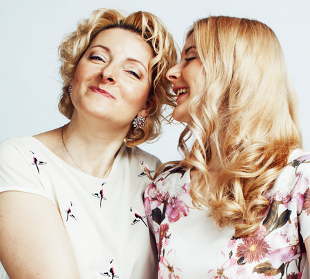 mother with daughter together posing happy smiling isolated on wの写真素材
