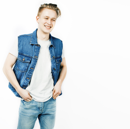 young handsome teenage hipster guy posingの写真素材