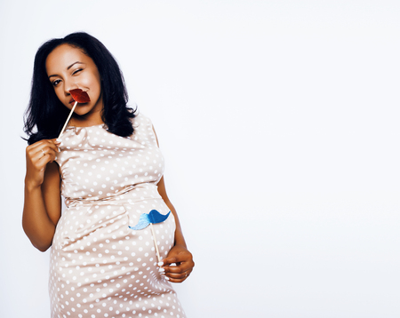 young pretty african american woman pregnant happy smiling, posing on white background isolated , lifestyle people concept copyspace close upの写真素材