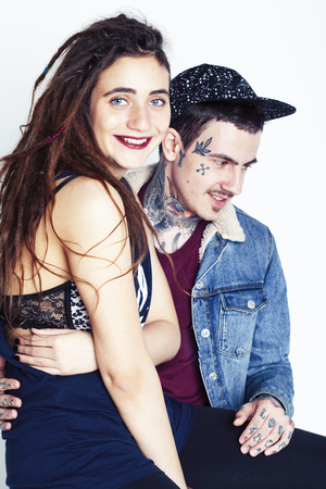 young pretty couple together, lifestyle people concept, boyfriend and girlfriend tattoo close upの写真素材