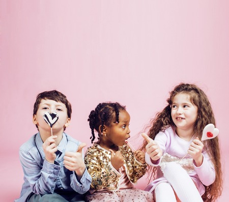 lifestyle people concept: diverse nation children playing together, boy and girl, caucasian and...