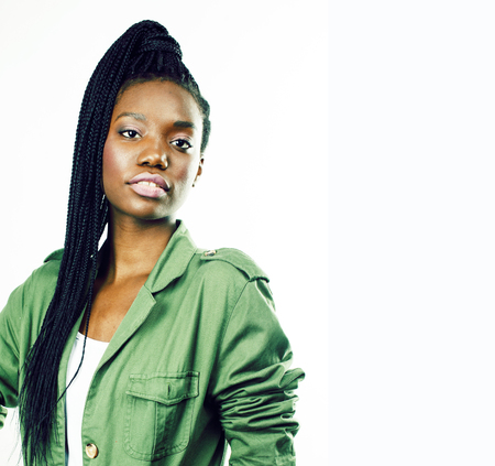 young pretty african-american girl posing cheerful emotional on white background isolated, lifestyle people concept close upの写真素材