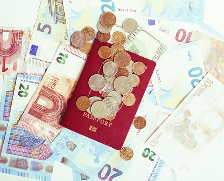 Cash on table isolated: dollars, euro, rubl broken money. All in mess, global crisis . passport travel conceptの写真素材