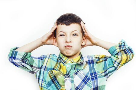little cute boy on white background gesture smiling close up, lifestyle people conceptの写真素材