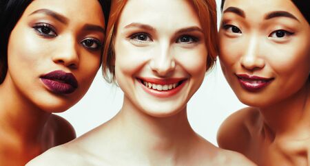 different nation woman: african-american, caucasian, asian together isolated on white background happy smiling, diverse type on skin, lifestyle people conceptの写真素材