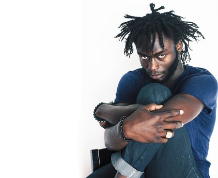 young handsome afro american man gesturing emotional posing isolated on white background, lifestyle...