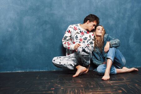young pretty boy and girl friends happy smiling together in interior, lifestyle people conceptの写真素材