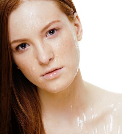 spa picture attractive lady young red hair isolated on white backgroundの写真素材
