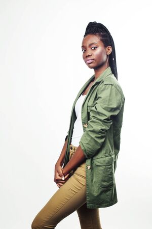young pretty african-american girl posing cheerful emotional on white background isolated, lifestyle people conceptの写真素材