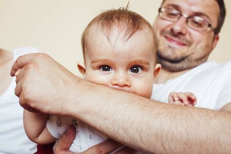 young real father with little cute son todler on kitchen in morning, lifestyle people concept