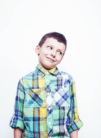 little cute real boy on white background gesture smiling close up, lifestyle people conceptの写真素材
