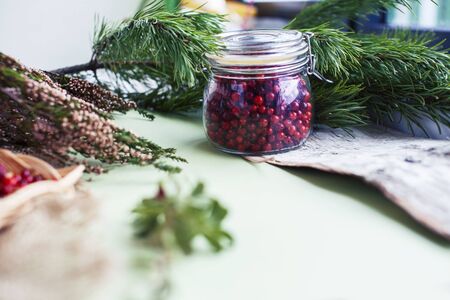 autumn berries on table, lingonberry raw closeupの写真素材
