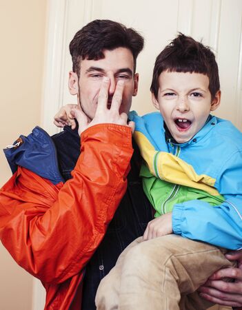 faher and son together having fun at home, lifestyle happy family, people at home