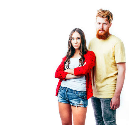 young attractive couple together having fun happy smiling isolated on white background, emotional posing, lifestyle people conceptの写真素材