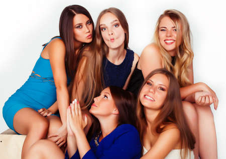 many girlfriends hugging celebration on white background, smiling talking chat closeup, lifestyle people conceptの写真素材