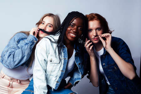 diverse multi nation girls group, teenage friends company cheerful having fun, happy smiling, cute posing isolated on white background, lifestyle people concept, african-american and caucasianの写真素材