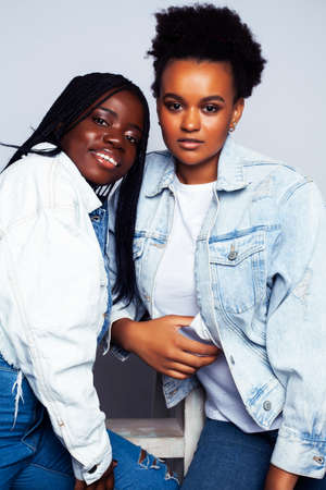 diverse multi nation girls group, teenage friends company cheerful having fun, happy smiling, cute posing isolated on white background, lifestyle people concept, african-american and caucasianの写真素材