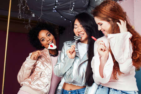 Lifestyle and people concept: young pretty diversity nations woman celebrating on birth day party...