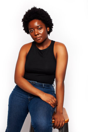 young pretty african american woman with natural makeup posing emotional isolated on white background, lifestyle people conceptの写真素材
