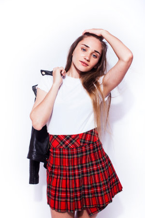 young pretty stylish hipster girl in leather jacket and school shirt posing emotional isolated on...