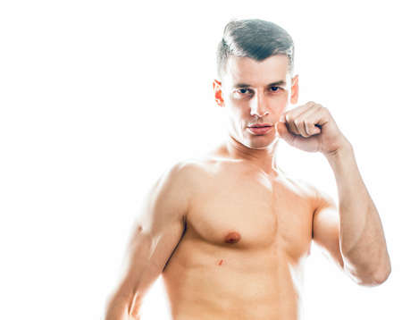 young handsome agressive man boxing isolared on white background, lifestyle sport people conceptの写真素材