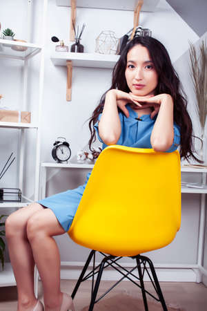 young pretty asian woman smiling in her office, lifestyle people conceptの写真素材