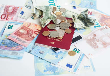 Cash on table isolated: dollars, euro, rubl broken money. All in mess, global crisis . passport travel conceptの写真素材
