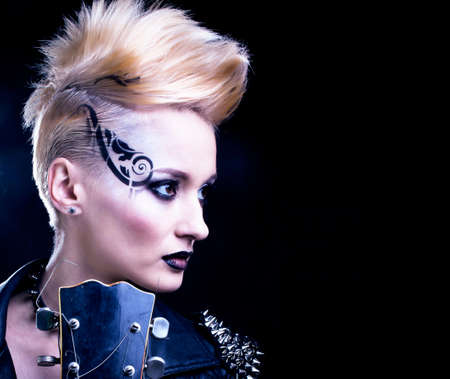 Fashion Rocker Style Model Girl Portrait. Hairstyle. Punk Woman Makeup, Hairdo and black Nails....
