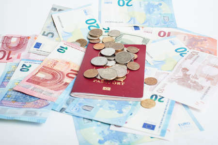 Cash on table isolated: dollars, euro, rubl broken money. All in mess, global crisis . passport travel conceptの写真素材