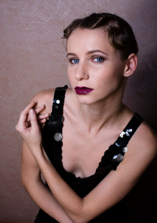 beauty blond woman in studio on black background, stylish fashion retro vintage copyspace close up