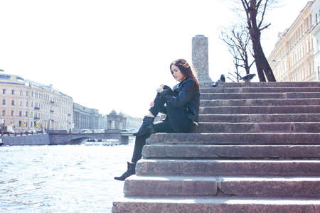 young pretty girl outside in city street happy smiling, lifestyle fashion peopple concept