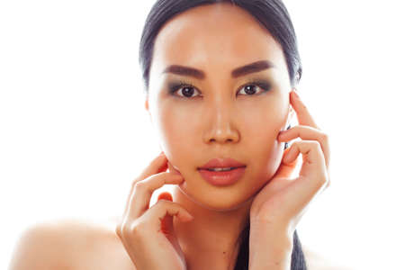 young pretty asian woman close up isolated on white background, spa womans day conceptの写真素材