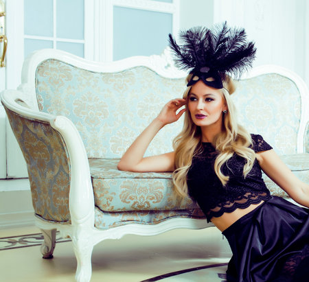 pretty blond woman in rich luxury house interior, fashion peopleの写真素材