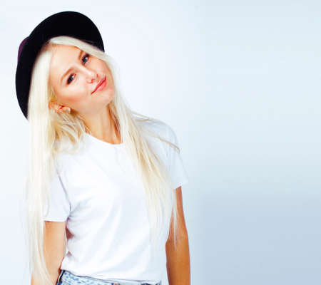 young pretty stylish blond hipster girl in hat posing emotional isolated on white background, lifestyle people conceptの写真素材
