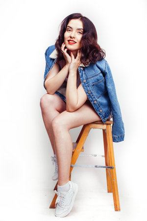 young pretty curly girl posing emotional happy smiling on white background, lifestyle people conceptの写真素材